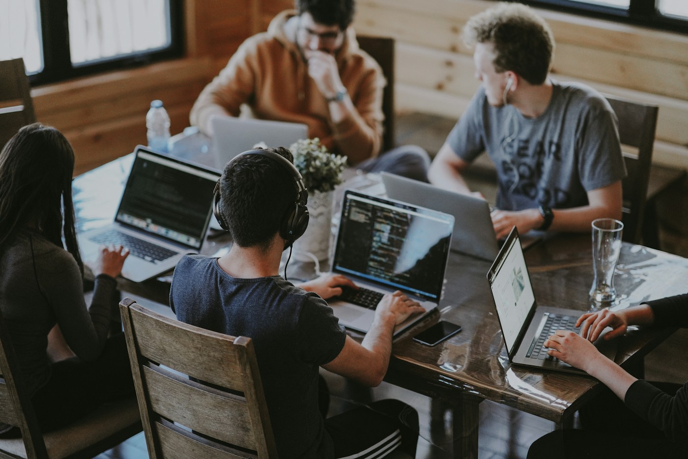 Creative and media professionals collaborating around a shared campaign workspace