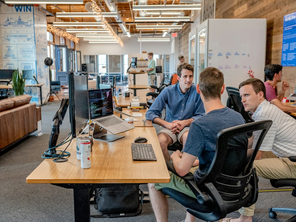 Marketing specialists connecting brand, content, media, and measurement in a shared planning session